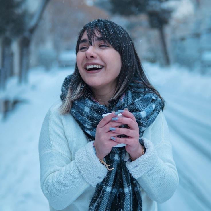 Anya Rao, Lead Design Curator at SerenePathHorizon, reviewing corporate floral arrangements